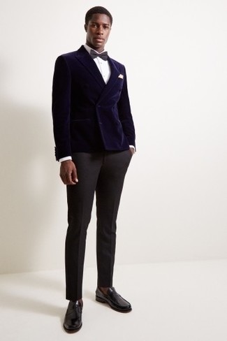 Bow-tie Outfits For Men: A navy velvet double breasted blazer and a bow-tie are the ideal way to introduce effortless cool into your casual styling rotation. For a more refined twist, introduce a pair of black leather loafers to the equation.
