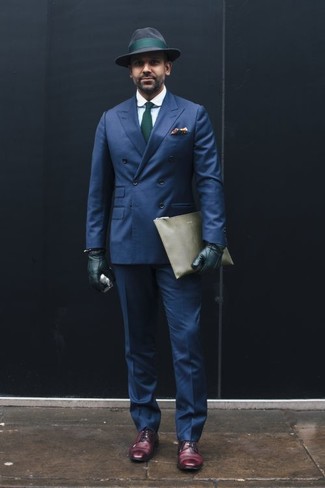Dark Green Leather Gloves Outfits For Men: Definitive proof that a navy double breasted blazer and dark green leather gloves look amazing when matched together in a laid-back outfit. You can stick to a more classic route in the shoe department by rounding off with a pair of dark purple leather derby shoes.