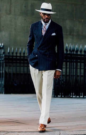 Blue Vertical Striped Double Breasted Blazer Outfits For Men: This sophisticated combination of a blue vertical striped double breasted blazer and white dress pants is really a statement-maker. Tobacco leather tassel loafers will give a dose of stylish nonchalance to an otherwise sober outfit.