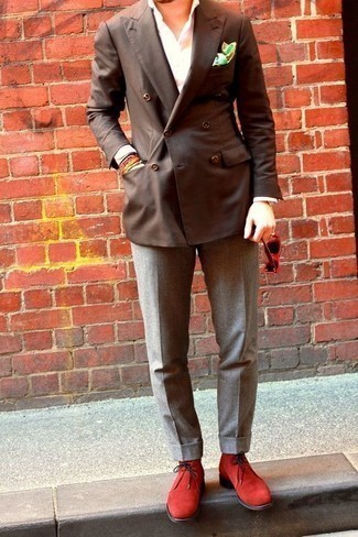 Brown Double Breasted Blazer Outfits For Men: Pairing a brown double breasted blazer and grey dress pants is a fail-safe way to infuse style into your current lineup. Red suede desert boots are a simple way to infuse a touch of stylish nonchalance into this ensemble.