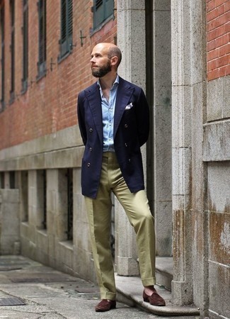 Dark Green Dress Pants Outfits For Men: This polished pairing of a navy double breasted blazer and dark green dress pants will cement your styling skills. Inject a dose of stylish effortlessness into this ensemble by finishing off with a pair of brown suede loafers.