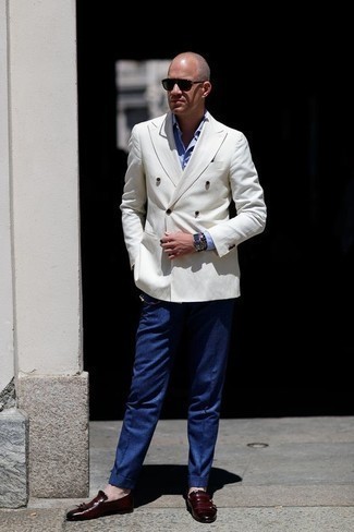 Navy Canvas Watch Outfits For Men: Marry a white double breasted blazer with a navy canvas watch to assemble a casually dapper look. If you need to easily polish off this look with one single item, complete your look with a pair of burgundy fringe leather loafers.