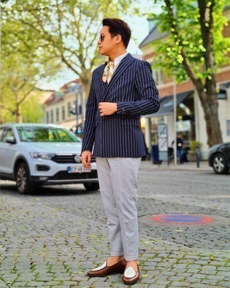 White Bandana Dressy Outfits For Men: For a casual look, consider teaming a navy vertical striped double breasted blazer with a white bandana — these two items work pretty good together. Complete this getup with brown leather loafers to effortlessly bump up the classy factor of any getup.