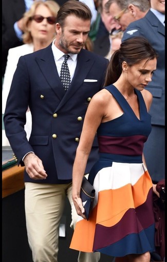 David Beckham wearing Navy Double Breasted Blazer, White Dress Shirt, Beige Dress Pants, Navy Print Tie