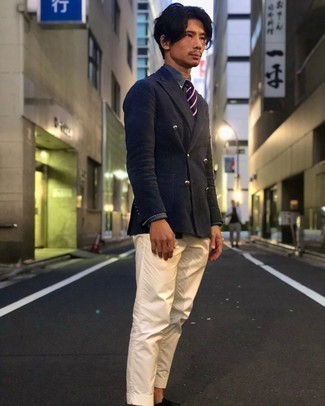 Navy Double Breasted Blazer Outfits For Men: Choose a navy double breasted blazer and white dress pants for a stylish and elegant look. When this look appears all-too-dressy, dress it down by finishing with black suede oxford shoes.