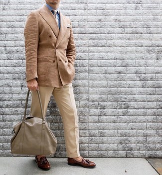 Beige Leather Tote Bag Outfits For Men: To don a casual look with a clear fashion twist, you can wear a tan double breasted blazer and a beige leather tote bag. A pair of brown leather tassel loafers will put a more refined spin on an otherwise mostly dressed-down look.