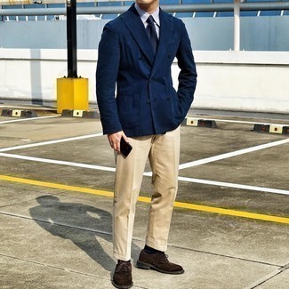 Navy and White Double Breasted Blazer Outfits For Men: To look like a complete gent, wear a navy and white double breasted blazer with khaki dress pants. For something more on the casually cool side to complete this outfit, complement this outfit with a pair of dark brown suede brogues.