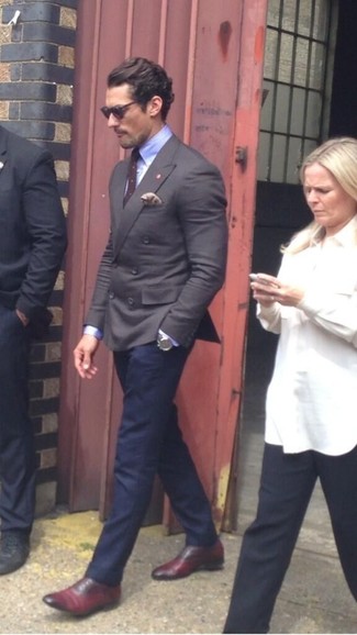 David Gandy wearing Charcoal Double Breasted Blazer, Light Blue Dress Shirt, Navy Dress Pants, Burgundy Leather Oxford Shoes