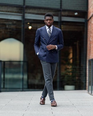 Tobacco Fringe Leather Loafers Outfits For Men: When it comes to timeless polished style, this pairing of a navy double breasted blazer and charcoal dress pants never disappoints. Let your outfit coordination skills truly shine by rounding off your look with a pair of tobacco fringe leather loafers.