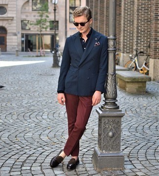 Tobacco Dress Pants Outfits For Men: Channel your manly elegance with a navy double breasted blazer and tobacco dress pants. Let your outfit coordination savvy truly shine by finishing off this outfit with a pair of dark brown fringe leather loafers.