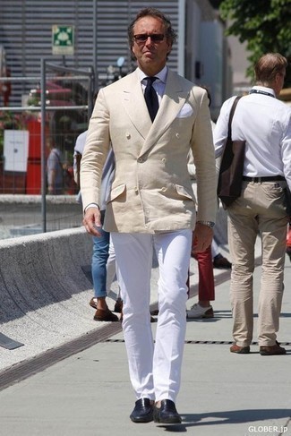 Beige Double Breasted Blazer Outfits For Men: A beige double breasted blazer and white dress pants are among the key elements in a great man's wardrobe. You can take a more casual route on the shoe front with navy leather loafers.