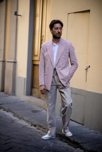 Burgundy Blazer Outfits For Men: A burgundy blazer and beige dress pants make for the ultimate stylish outfit. Wondering how to finish? Complement this outfit with a pair of white canvas low top sneakers for a more relaxed spin.