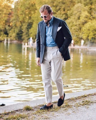 Blue Vertical Striped Blazer Outfits For Men: Combining a blue vertical striped blazer and white dress pants is a guaranteed way to inject your styling lineup with some rugged elegance. When it comes to footwear, this getup is completed well with navy suede loafers.