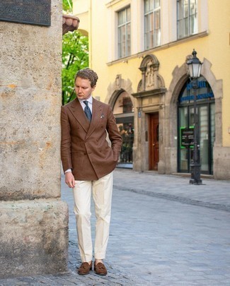 Double Breasted Blazer Outfits For Men: Wear a double breasted blazer and beige dress pants for a proper refined outfit. Introduce a pair of brown suede tassel loafers to this getup to add an element of stylish effortlessness to your outfit.