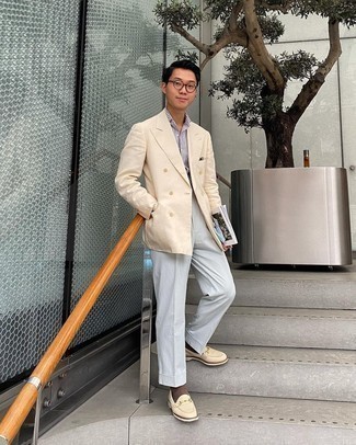 Men's Outfits 2021: The sartorial arsenal of any discerning gent should always include such wardrobe heroes as a beige linen double breasted blazer and grey dress pants. A trendy pair of beige leather loafers is a simple way to transform your getup.