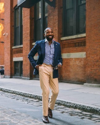 Navy Double Breasted Blazer Outfits For Men: Pair a navy double breasted blazer with khaki dress pants if you're going for a proper, trendy outfit. Dark brown leather tassel loafers are a guaranteed way to give a touch of stylish casualness to your look.