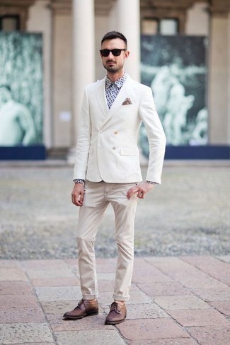 Khaki Jeans Outfits For Men: For an effortlessly neat look, go for a white double breasted blazer and khaki jeans — these two items go beautifully together. Take your ensemble a more sophisticated path by wearing burgundy leather derby shoes.