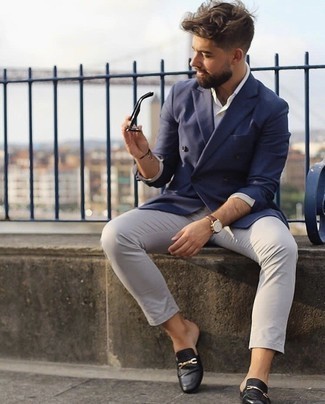 Brown Leather Watch Outfits For Men: You'll be surprised at how easy it is for any gentleman to put together this relaxed casual look. Just a navy double breasted blazer and a brown leather watch. Black leather loafers will give a touch of sophistication to an otherwise everyday outfit.