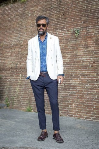 Tobacco Leather Derby Shoes Outfits: This combination of a white double breasted blazer and navy chinos is truly a statement-maker. Put an elegant spin on this outfit by wearing a pair of tobacco leather derby shoes.