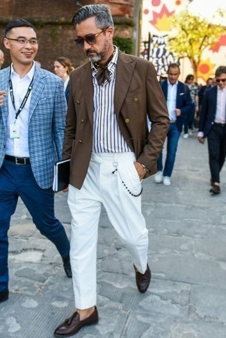 White Vertical Striped Short Sleeve Shirt Outfits For Men: Go for a simple yet on-trend choice by pairing a white vertical striped short sleeve shirt and white dress pants. Our favorite of a multitude of ways to round off this getup is with dark brown leather tassel loafers.