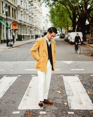 500+ Fall Outfits For Men: Loving how this pairing of a tobacco double breasted blazer and white dress pants instantly makes any man look smart and classy. Switch up this look by sporting a pair of brown suede loafers. It's a great choice when it comes to picking out a well-coordinated outfit for summer-to-fall weather.