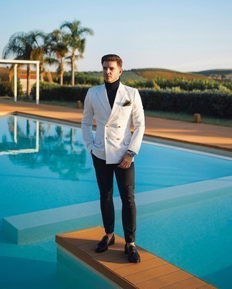Black Leather Tassel Loafers Outfits: This pairing of a white double breasted blazer and black chinos is extra versatile and provides a clean and neat look. To give this outfit a smarter touch, why not add black leather tassel loafers to this ensemble?