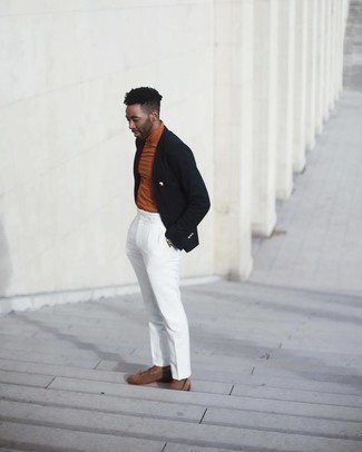 Orange Turtleneck Outfits For Men: An orange turtleneck and white dress pants are a truly smart combo for you to try. Consider a pair of brown suede tassel loafers as the glue that brings this outfit together.
