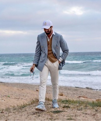 Brown Waistcoat Outfits: Opt for a brown waistcoat and white chinos if you're going for a neat, stylish look. As for the shoes, you can follow a more casual route with a pair of light blue athletic shoes.