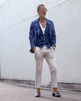 White V-neck T-shirt Outfits For Men: If you love classic combos, then you'll like this pairing of a white v-neck t-shirt and beige chinos. Rounding off with dark brown leather tassel loafers is an effortless way to add a little depth to this outfit.