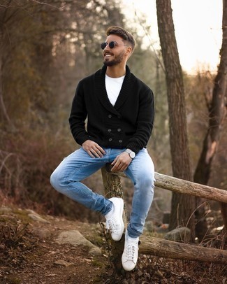 Black Cardigan Outfits For Men: For something more on the casually edgy side, consider this pairing of a black cardigan and light blue ripped jeans. For extra fashion points, complement this look with a pair of white leather low top sneakers.