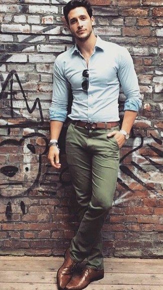 Brown Leather Derby Shoes Outfits: For an outfit that's casually neat and wow-worthy, try teaming a light blue dress shirt with olive chinos. Add a different twist to an otherwise too-common outfit by finishing off with a pair of brown leather derby shoes.