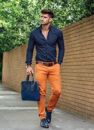 Navy Leather Briefcase Outfits: A navy dress shirt looks especially nice when paired with a navy leather briefcase in a laid-back outfit. If you wish to easily polish up this outfit with footwear, introduce navy leather oxford shoes to the mix.