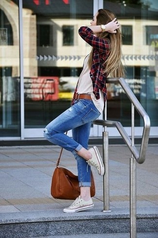 Navy Ripped Skinny Jeans Outfits: For an outfit that offers function and fashion, try pairing a red and navy gingham dress shirt with navy ripped skinny jeans. Let your styling skills really shine by complementing your look with a pair of white low top sneakers.