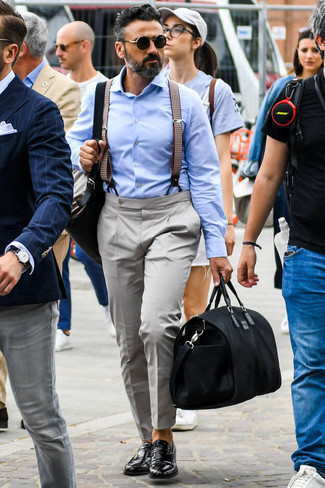 Dark Brown Suspenders Outfits: This pairing of a light blue dress shirt and dark brown suspenders is hard proof that a simple casual outfit can still be really interesting. Complete your ensemble with black leather loafers to effortlessly up the classy factor of this look.
