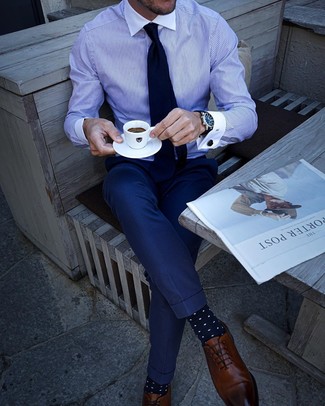 Blue Polka Dot Socks Outfits For Men: A white and blue vertical striped dress shirt and blue polka dot socks are the kind of a never-failing casual look that you so awfully need when you have no time to spare. Why not add brown leather oxford shoes to your look for a hint of class?