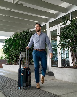 Black Suitcase Outfits For Men: Dress in a light blue dress shirt and a black suitcase if you're on the lookout for an outfit idea for when you want to look casually dapper. For something more on the classier end to finish this ensemble, add tan suede tassel loafers to your ensemble.