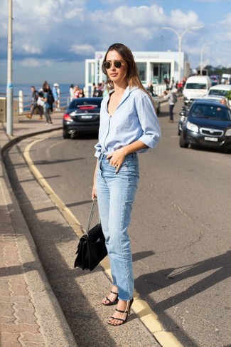 1200+ Summer Outfits For Women: You'll be surprised at how easy it is to get dressed like this. Just a light blue dress shirt and light blue jeans. Black leather heeled sandals look fabulous here. So if it's a roasting hot day and you want to look chic without putting too much effort, this look will do the job in seconds time.
