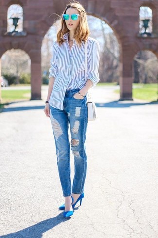 Light Blue Vertical Striped Dress Shirt Outfits For Women: Show off your outfit coordination chops in this casual pairing of a light blue vertical striped dress shirt and blue ripped jeans. Rounding off with a pair of aquamarine suede pumps is an easy way to inject a hint of polish into this look.