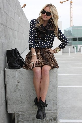 Chiffon Shirt Outfits For Women: This off-duty combination of a chiffon shirt and a brown leopard skater skirt is capable of taking on different nuances according to how you style it. For something more on the classier side to finish off your outfit, throw in a pair of black leather ankle boots.