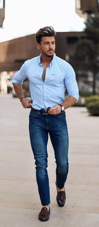 Navy Skinny Jeans Smart Casual Outfits For Men: For a casually dapper look, consider teaming a light blue dress shirt with navy skinny jeans — these two items go nicely together. Go ahead and introduce a pair of dark brown leather tassel loafers to the equation for an added touch of style.