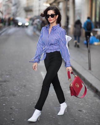 Black Pants with Blue Shirt Outfits For Women: You're looking at the undeniable proof that a blue shirt and black pants look amazing when you pair them up. Why not complete your getup with a pair of white elastic ankle boots for an added touch of class?