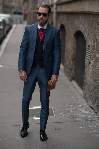 Justin O'Shea wearing Black Leather Derby Shoes, Charcoal Dress Shirt, Black Waistcoat, Navy Suit