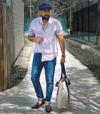 Men's White and Navy Canvas Tote Bag, Dark Brown Leather Driving Shoes, Navy Jeans, White Print Short Sleeve Shirt