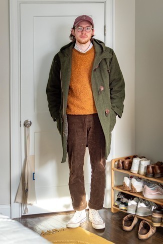 Olive Duffle Coat Outfits For Men: Putting together an olive duffle coat and brown corduroy chinos is a fail-safe way to inject style into your current fashion mix. To inject an air of stylish casualness into this getup, add white canvas high top sneakers to the equation.