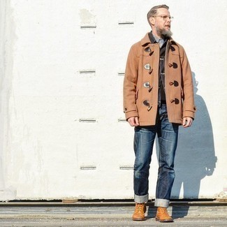 Camel Duffle Coat Outfits For Men: This combo of a camel duffle coat and navy jeans looks on-trend, but it's super easy to pull together. Take your outfit in a more elegant direction by wearing tobacco leather brogue boots.