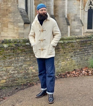 Blue Beanie Outfits For Men: For a foolproof casual option, you can rely on this combination of a beige duffle coat and a blue beanie. Black leather casual boots are the most effective way to breathe an air of class into this outfit.