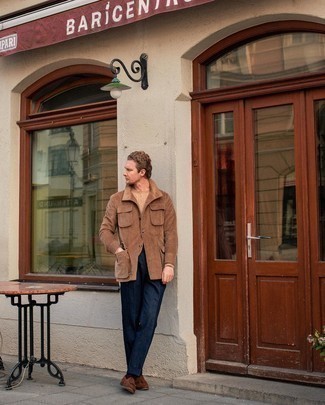 Tan Cable Sweater Outfits For Men: For something more on the off-duty side, opt for this pairing of a tan cable sweater and navy chinos. Finishing off with dark brown suede tassel loafers is a fail-safe way to add a little flair to this look.