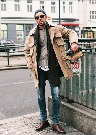 Navy Ripped Jeans Outfits For Men: If you're a fan of city casual style, why not take this pairing of a khaki field jacket and navy ripped jeans for a walk? Class up this ensemble with a pair of dark brown leather low top sneakers.