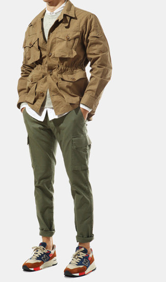 Khaki Field Jacket Outfits: Showcase your prowess in men's fashion in this laid-back combo of a khaki field jacket and olive cargo pants. Hesitant about how to finish? Throw a pair of multi colored athletic shoes in the mix to mix things up.