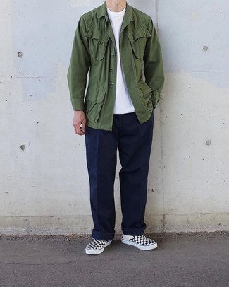 Olive Field Jacket Outfits: Pair an olive field jacket with navy chinos to put together an incredibly sharp and modern-looking casual outfit. A great pair of black and white check canvas slip-on sneakers pulls this outfit together.